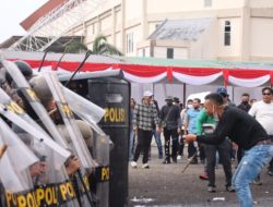 Polres OKI Gelar Apel Dan Simulasi Sipamkota Jamin Keamanan Pilkada 2024.